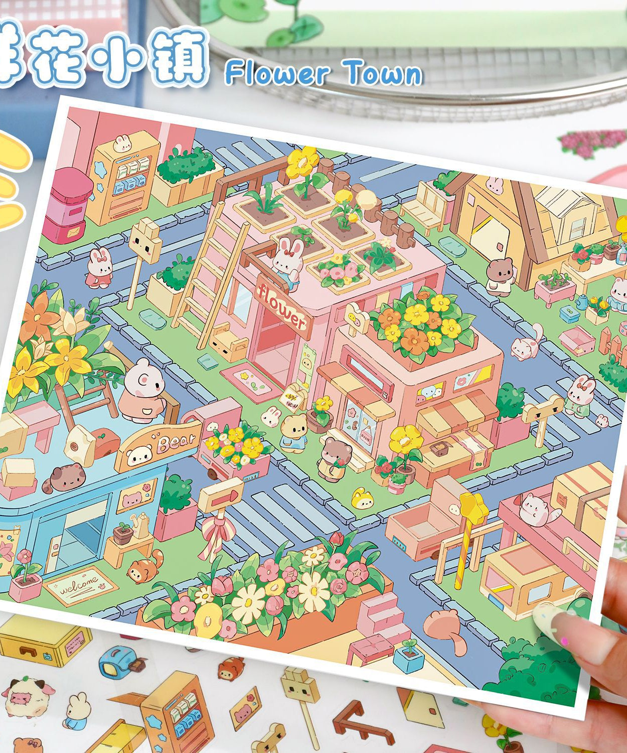 Colorful illustration of a cartoon town with buildings and animals, labeled 'Flower Town'.